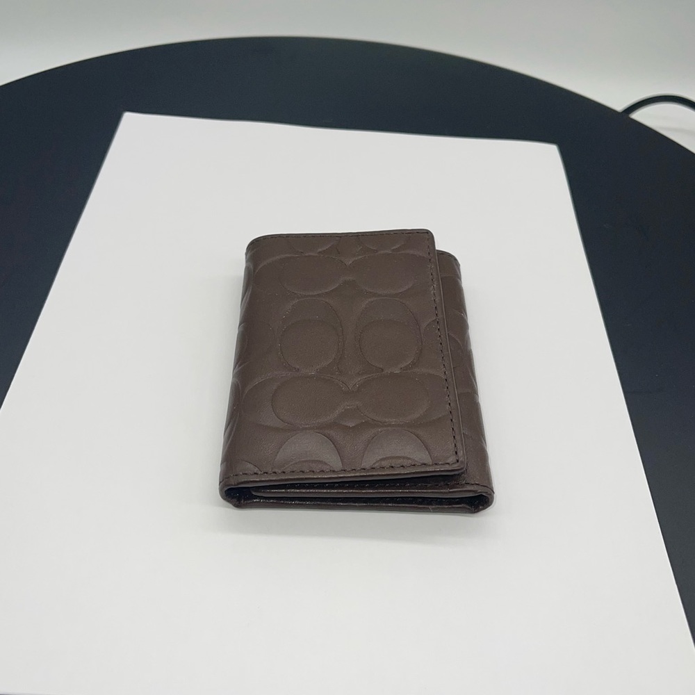 Coach Signature Embossed Trifold  Wallet